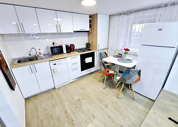 Апартаменти Lovely Duplex Cismigiu Park - Pop1 Бухарест